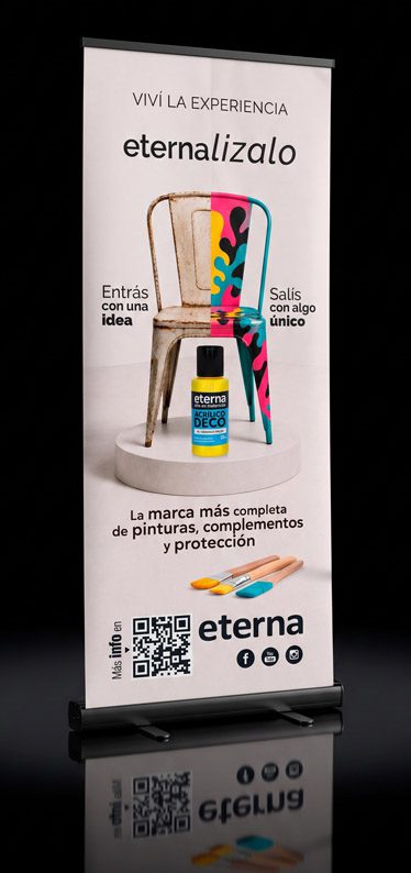 Banner de Eterna «Viví la experiencia, eternalizalo», con una silla intervenida y pintura Acrílico Deco
